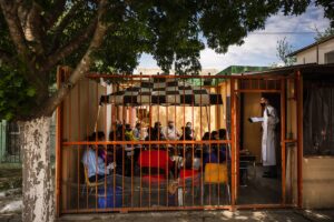 The Rev. Daniel Fickenscher, pastor at Iglesia Luterana Cristo El Salvador, Del Rio, Texas, leads worship in the courtyard of a congregation member’s home in Ciudad Acuña, Mexico.