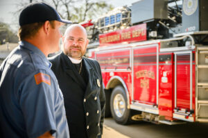 Pastor with Fire Chief
